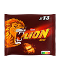 A pack of Nestlé Lion Mini wafer bars with caramel and cereals coated in milk chocolate, featuring a lion graphic on the packaging.