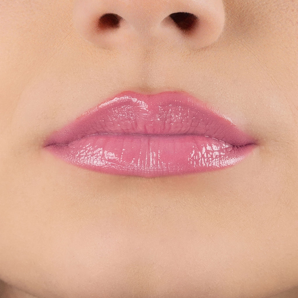 Close-up of a person's lips with pink lipbalm