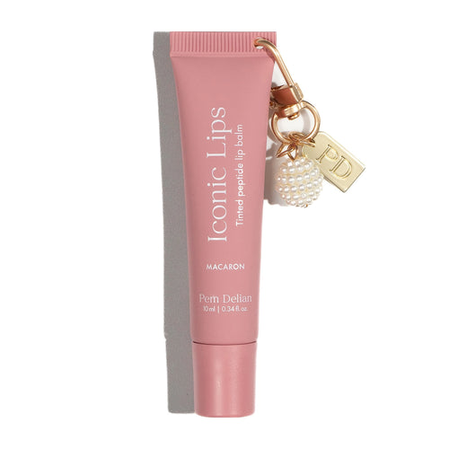 Pem Delian Iconic Lips Tinted Peptide Macaron lip balm tube with keychain on a white background