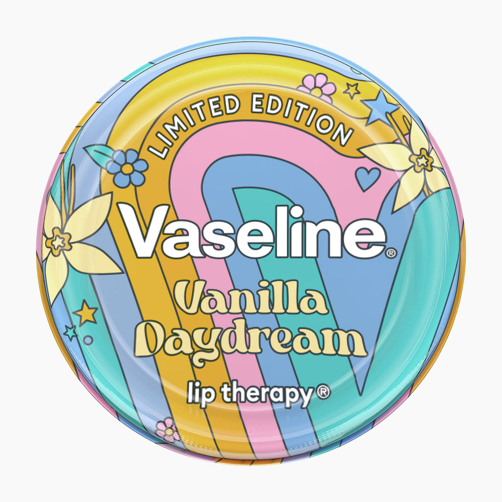 Vaseline Vanilla Daydream lip therapy lip balm compact in a round, colorful design featuring pastel rainbow stripes, flowers, and stars on a white background.
