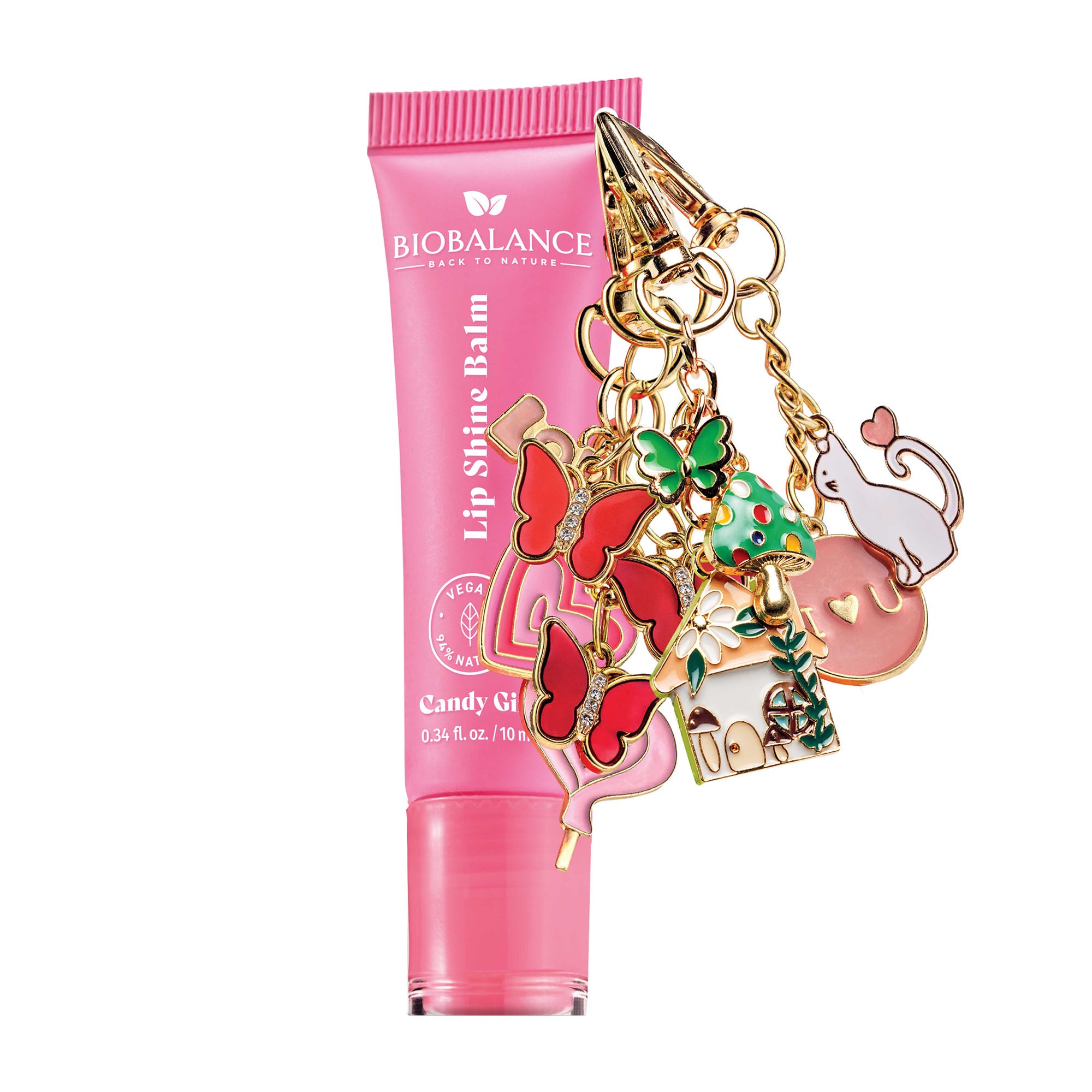 Pink lip balm with colorful charms on a white background