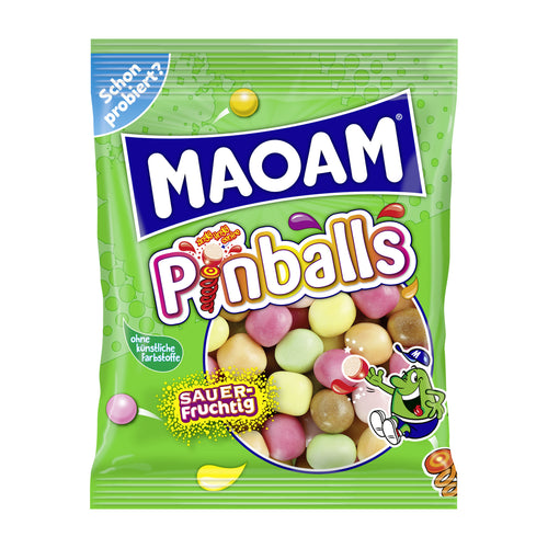Packaging of Maoam Pinballs chewy candy with colorful candies and green background