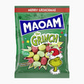 A bag of Maoam Dr. Seuss The Grinch chewy candy, featuring a green background with festive Grinch graphics, a clear window showing round multicolored candies, and a red 'Merry Grinchmas' banner at the top.
