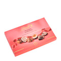 A rectangular Lindt box of marzipan pralines, featuring a pink background with images of the different varieties of marzipan chocolates on the cover.