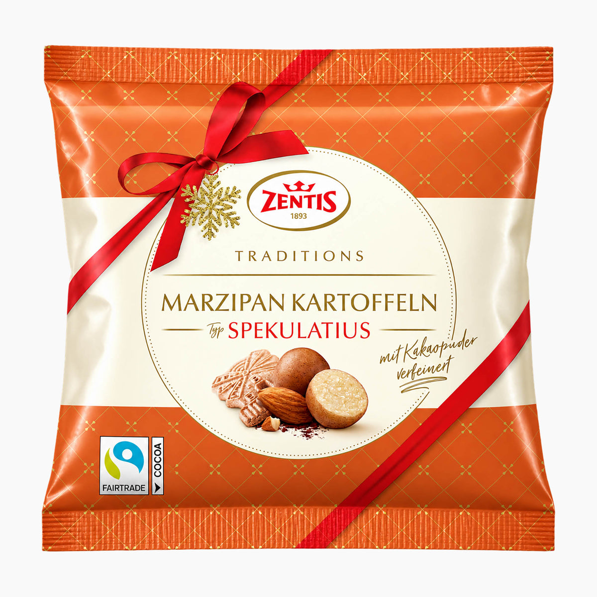 A package of Zentis Traditions Marzipan Potatoes Speculoos in a glossy orange and white bag decorated with a red ribbon and bow, featuring a Fairtrade logo.