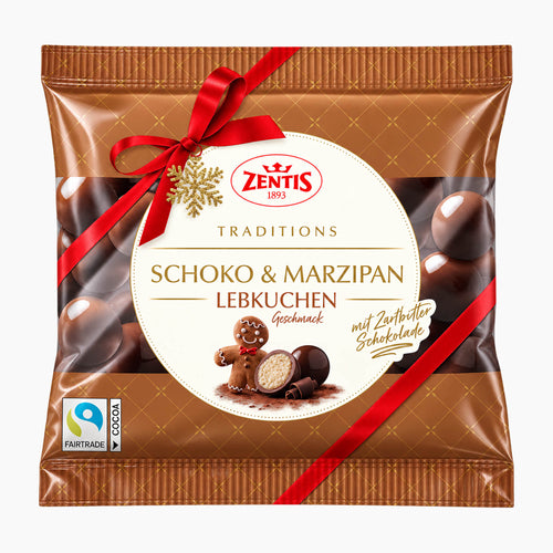 A package of Zentis Traditions Choco & Marzipan Gingerbread marzipan pralines, featuring a brown bag decorated with a red ribbon, a red bow, and a white circular label with product details and a gingerbread man illustration.