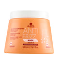 Orange jar of Alama Professional Anti-Frizz hair mask with white lid on a white background