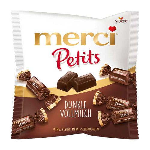 Packaging of merci Petits Dark Milk pralines with visible brand name.