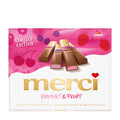 Packaging of merci Yoghurt & Fruit Selection chocolates with pink background and chocolate bars on a white background