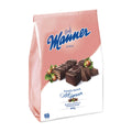Packaging of Manner Hazelnut Mignon Wafer Bars showing the product name and images of the chocolate bars with hazelnuts on a pink background.