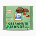 Ritter Sport Candied Almond milk chocolate bar packaging on a light gray background.