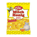 Packaging of Edel Milk-Honey hard caramel candies, featuring the product name, a honeycomb pattern, and an image of a bee.