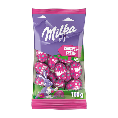 Milka Crunchy Cream Easter Eggs chocolate packaging on a white background.