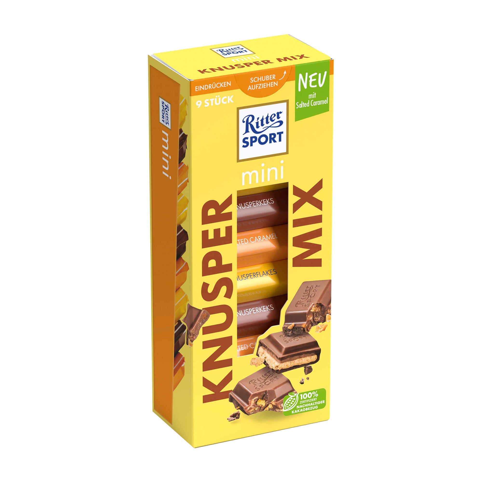 A package of Ritter Sport Mini Crunchy Mix tower with nine individually wrapped mini bars. The packaging is yellow with images of the chocolate bars with crispy toppings, including cornflakes and cookies.