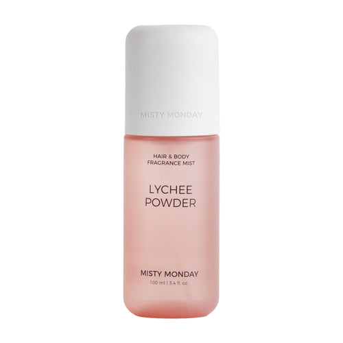 Misty Monday Lychee Powder Hair & Body Fragrance Mist in a frosted pink bottle with a white cap, on a white background.