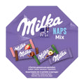 A gift pack of Milka Naps Mix featuring four varieties of mini chocolate bars, including Alpine Milk, Hazelnut, Crème au Cacao, and Strawberry.