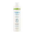 Naturland Tea Tree Oil shampoo bottle on a white background