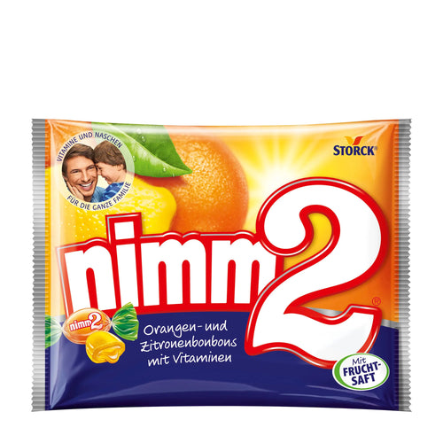 Packaging of Storck nimm2 candy with orange and lemon graphics on a white background