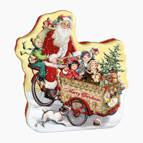 A vintage-style Heidel Christmas Nostalgia Cargo Bike Gift Tin, featuring Santa Claus riding a cargo bike with children, gifts, a Christmas tree, snow, and the words “Merry Christmas” on a light gray background.