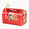 A red Christmas-themed Heidel Christmas Nostalgia Mailbox with vintage holiday illustrations, including Santa Claus and a child, along with a small 'Merry Christmas' tag on a white background.