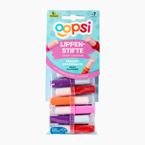 A 7-piece set of Oopsi fruit-flavored candy lipsticks in a clear plastic blister pack with a light blue and pink cardboard header. The lipsticks come in purple, red, orange, and pink colors.