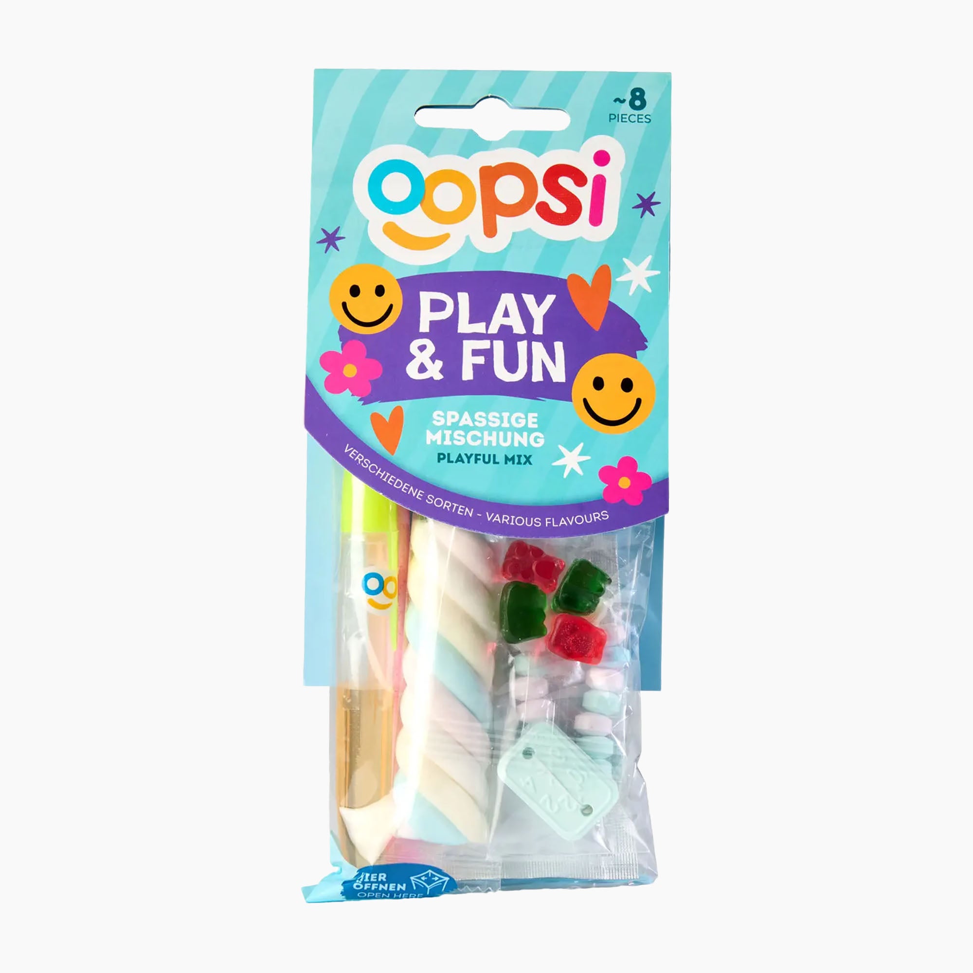 Oopsi Play & Fun Playful Mix candy assortment in its original packaging, showing colorful plastic pieces inside a clear bag with a blue and purple header card.