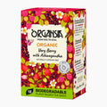 A box of Organsia Organic Very Berry with Ashwagandha tea bags, featuring a vibrant illustration of strawberries, raspberries, and berries on a cream background with green and black accents.