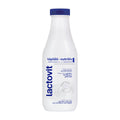 A bottle of Lactovit Nutritive shower gel, 600 mL, with a white and blue label, indicating it contains milk-based ingredients and is dermatologically tested.