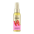 Pump bottle of Pantene x Robert Indiana Artist Edition Keratin Protect Oil on a white background