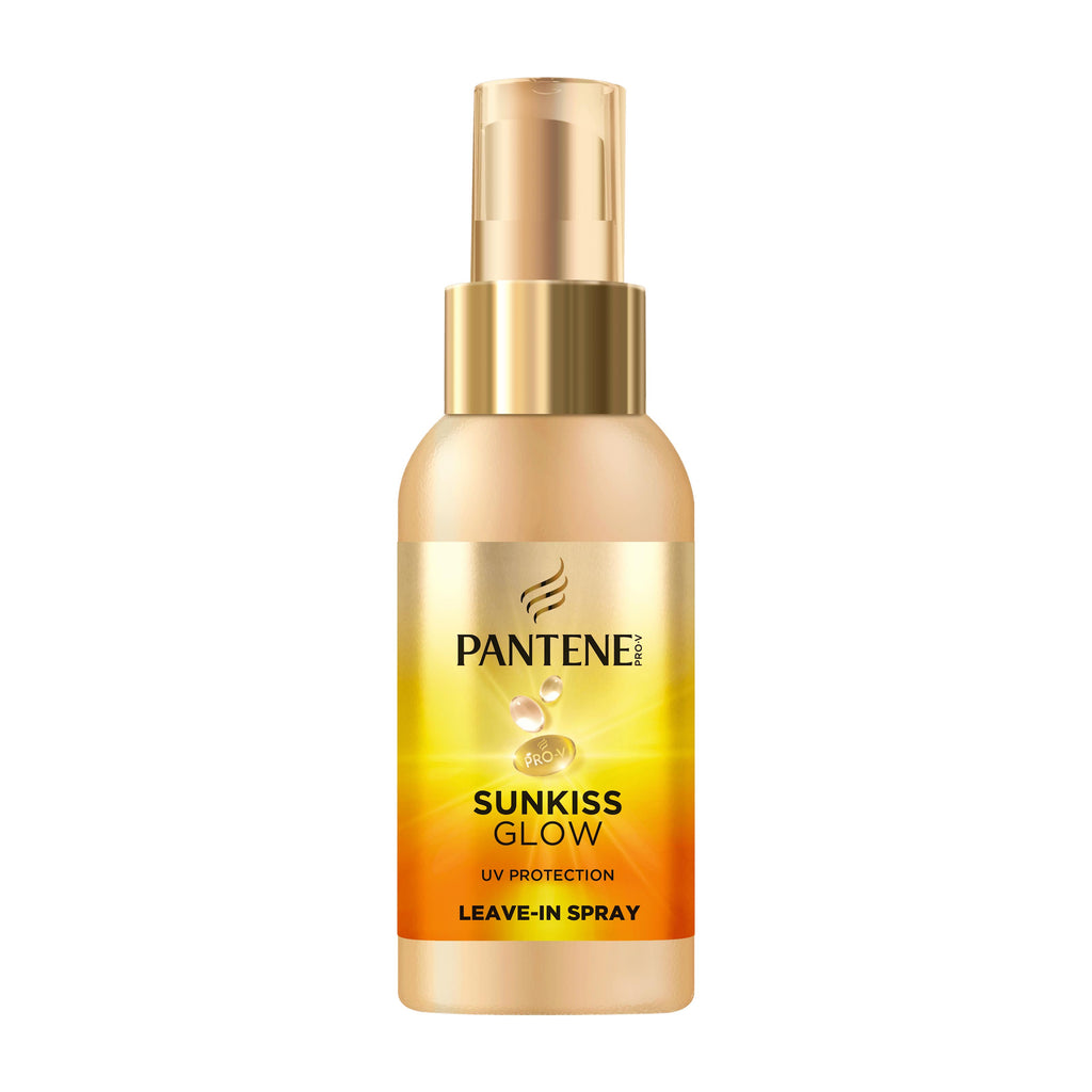 Pantene Sunkiss Glow UV Protection Leave-In Spray bottle with a gold and yellow gradient label and a metallic gold spray pump, shown on a plain white background.