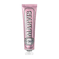 Pink tube of Marvis Sensitive Gums Gentle Mint toothpaste on a white background