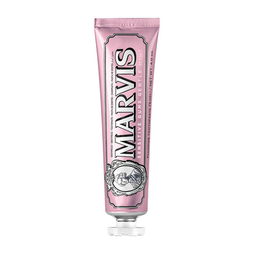 Pink tube of Marvis Sensitive Gums Gentle Mint toothpaste on a white background