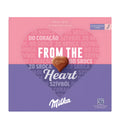 Milka chocolate box with pink and purple design and heart-shaped candy