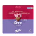 Milka chocolate box with a heart-shaped candy on a red and purple background