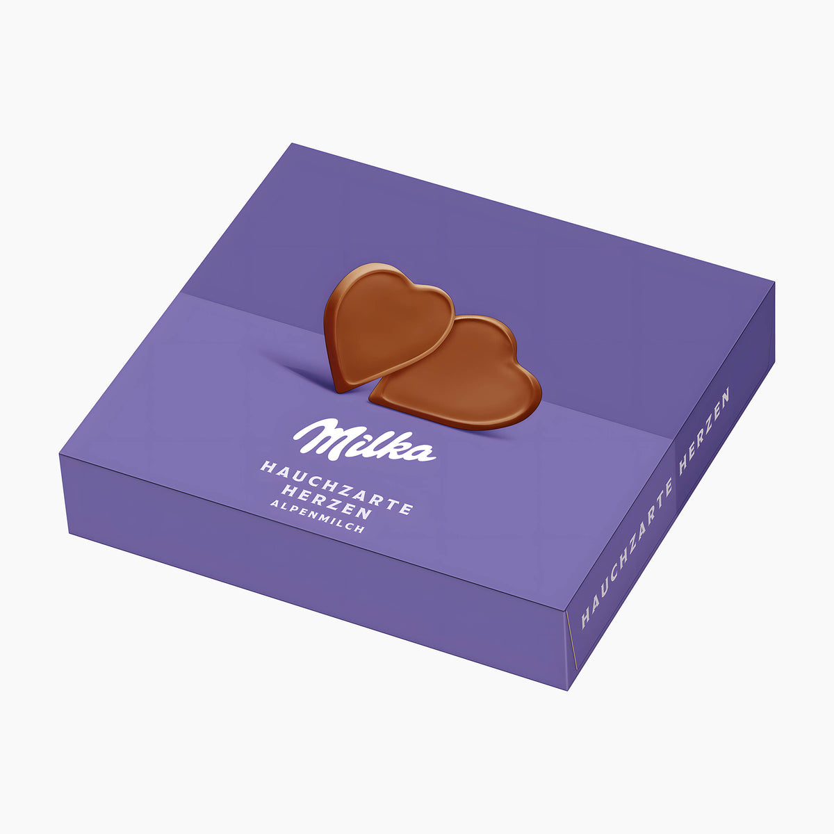 A purple rectangular box of Milka Delicate Hearts Alpine Milk heart-shaped milk chocolate pralines, featuring two glossy heart-shaped chocolate pieces on top and white text on a clean white background.