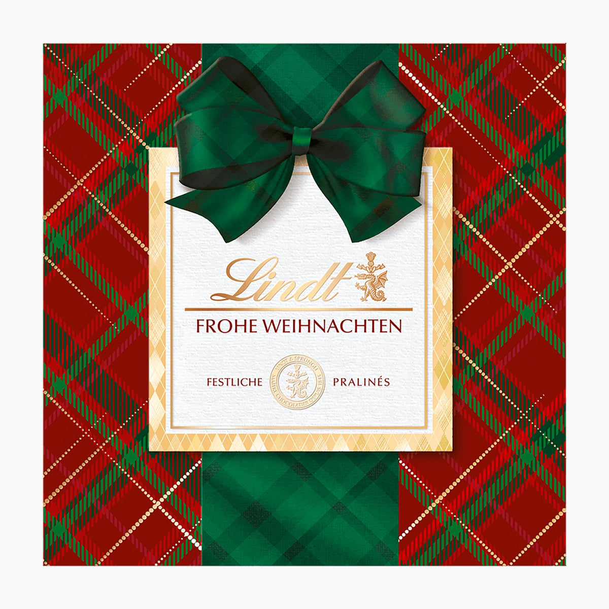 Lindt Karo Royal chocolate pralines 175g box with a red and green tartan pattern, a large dark green bow, and a central white label with gold lettering.