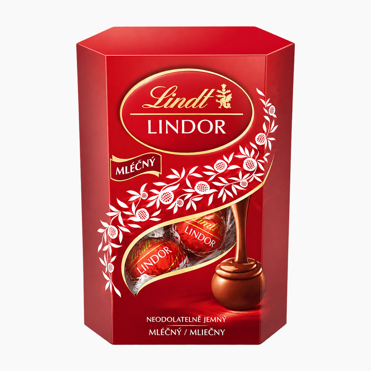 A red Lindt Lindor milk chocolate 50 g box with a clear window showing several wrapped chocolates, photographed on a plain light gray background.