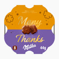 A pack of 8 Milka Many Thanks chocolate pralines in a decorative scalloped wrapper. The wrapper is split horizontally into a golden-yellow top half and a purple bottom half, with the words 'Many Thanks' in gold script.