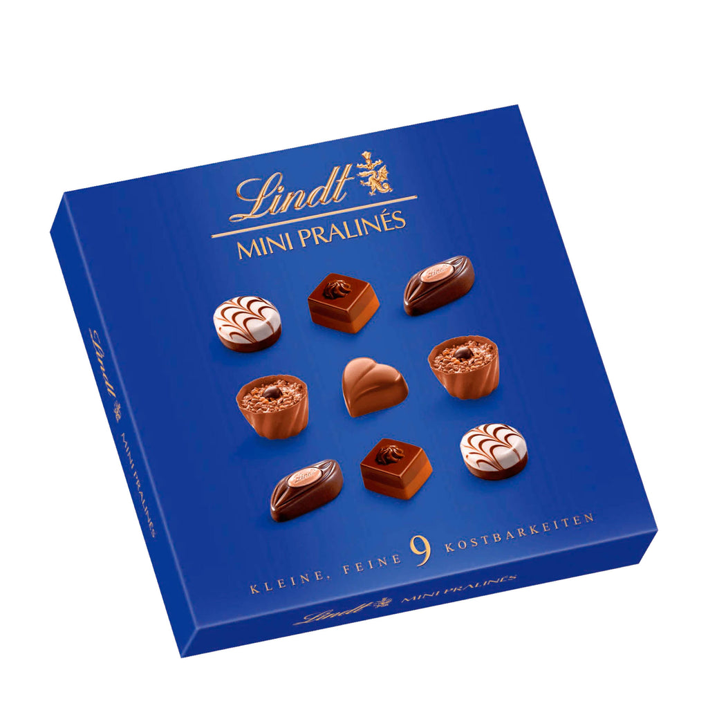 A box of Lindt Mini Pralines, displaying various chocolate pieces with a blue background.