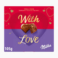 A 105g box of Milka 'With Love' hazelnut crunchy delight pralines, featuring a red and purple heart design with gold lettering and two heart-shaped chocolate pralines in the center.