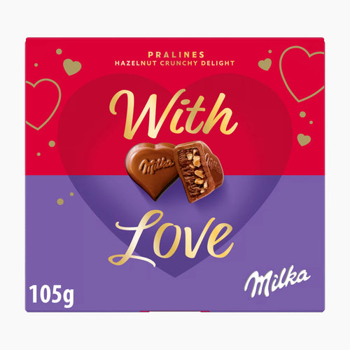 A 105g box of Milka 'With Love' hazelnut crunchy delight pralines, featuring a red and purple heart design with gold lettering and two heart-shaped chocolate pralines in the center.