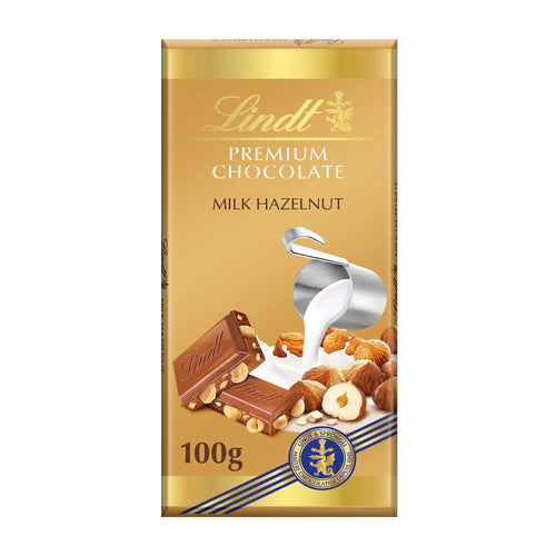 Lindt Premium Chocolate Milk Hazelnut gold packaging on a white background.