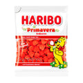 A package of Haribo Primavera Strawberries marshmallow pieces. The package is predominantly white with red text and features an illustration of a smiling character with a basket of marshmallows.