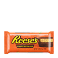 Packaging of Reese's Peanut Butter Cups showing one cup with the chocolate and peanut butter visible