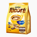 A yellow bag of Nestlé Ricoré 3-in-1 instant coffee, featuring a graphic of a steaming cup of coffee and coffee beans on a white background.