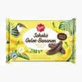 A package of Friedel Schoko Gelee-Bananen (Chocolate Jelly Bananas) featuring a bright yellow wrapper decorated with illustrations of bananas, a toucan, and chocolate jelly bananas, set against a plain white background.