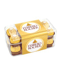 Box of Ferrero Rocher pralines with clear packaging on a white background