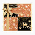 Lindt Goldstucke Rose - Rose Gold Nuggets Pralines box on a light gray background.