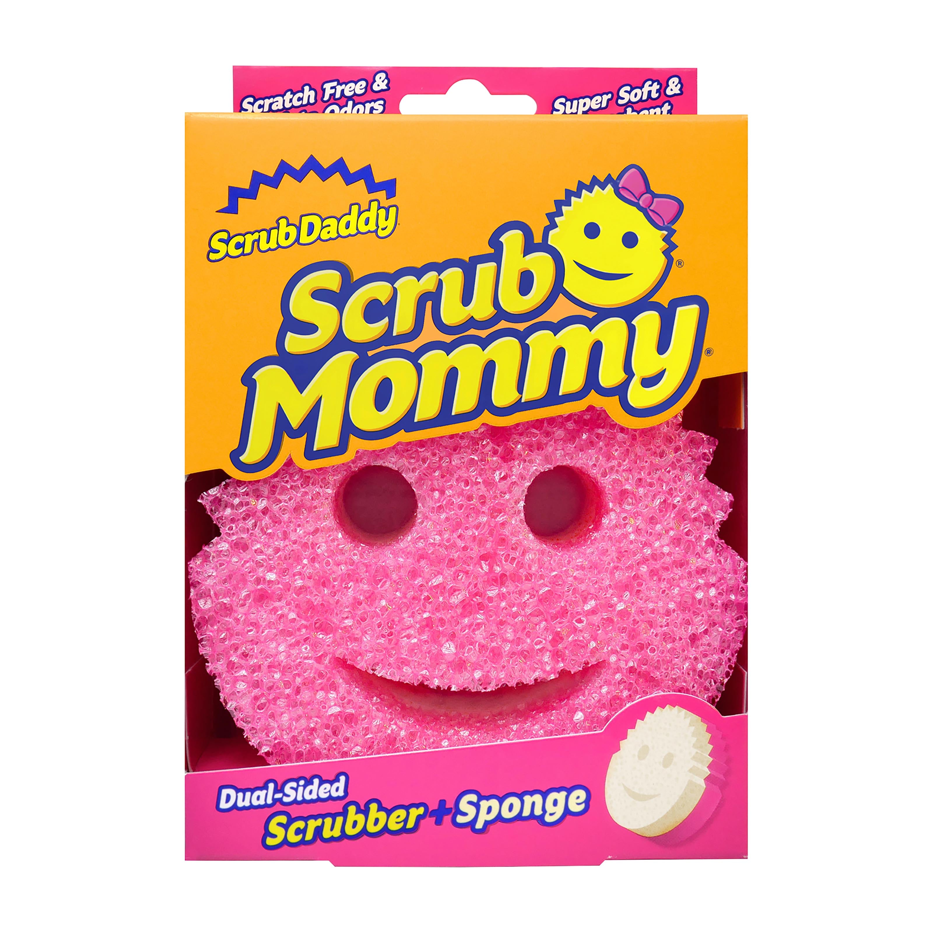 Scrub Daddy Scrub Mommy dual-sided scrubber and sponge set in its retail packaging, featuring a pink textured scrubber and a white sponge visible through a clear window on an orange and pink box.