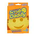 Scrub Daddy Original Flex Texture Scrubber in its orange retail packaging, featuring a yellow smiley face sponge.
